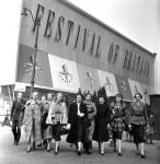 England. 1951. Fashion models performing in the Festival of Britain's Travelling Exhibition are pictured outside the venue.