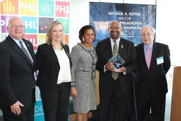 Mayor Michael A. Nutter (2nd from right) receives The Ultimate Solution Award from PHLLife, a division of the Philadelphia Convention & Visitors Bureau (PHLCVB) and is joined by (from L-R) Jack Ferguson, PHLCVB President & CEO, Bonnie Grant, PHLLife Executive Director, Julie Coker Graham, PHLCVB Executive Vice President and David King, PHLLife Board Chairman.