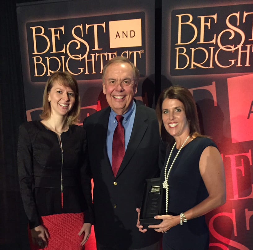 Deb Venable, Nimlok Chicago President (right) and Julia Poroshkova, Nimlok Chicago Marketing Manager (left) with event emcee Pat Cassidy (center) at the Chicago’s Best and Brightest Companies to Work For Symposium and Gala Photo Credit: Nimlok Chicago