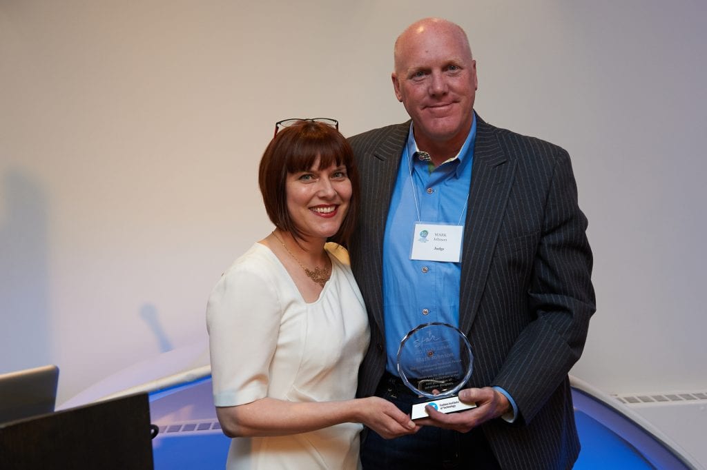 FIT educator Brenda Cowan presents Star Award to Mark Johnson Photo courtesy of Brenda Cowan