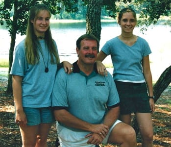 George and his daughters when they were younger.