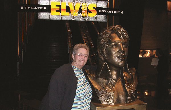 Judy Pulizzano with Elvis statue 600x400