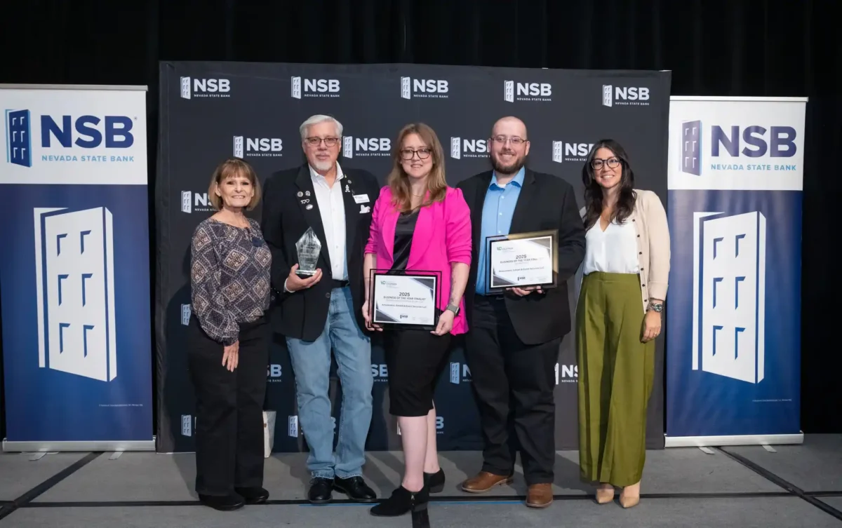 AE&ES leadership team posing at the Vegas Chamber’s 2025 Business of the Year Awards, including Lori Bordman, Gary Bordman, Stefanny Avera, Nathan Domino, and Megan Comfort.