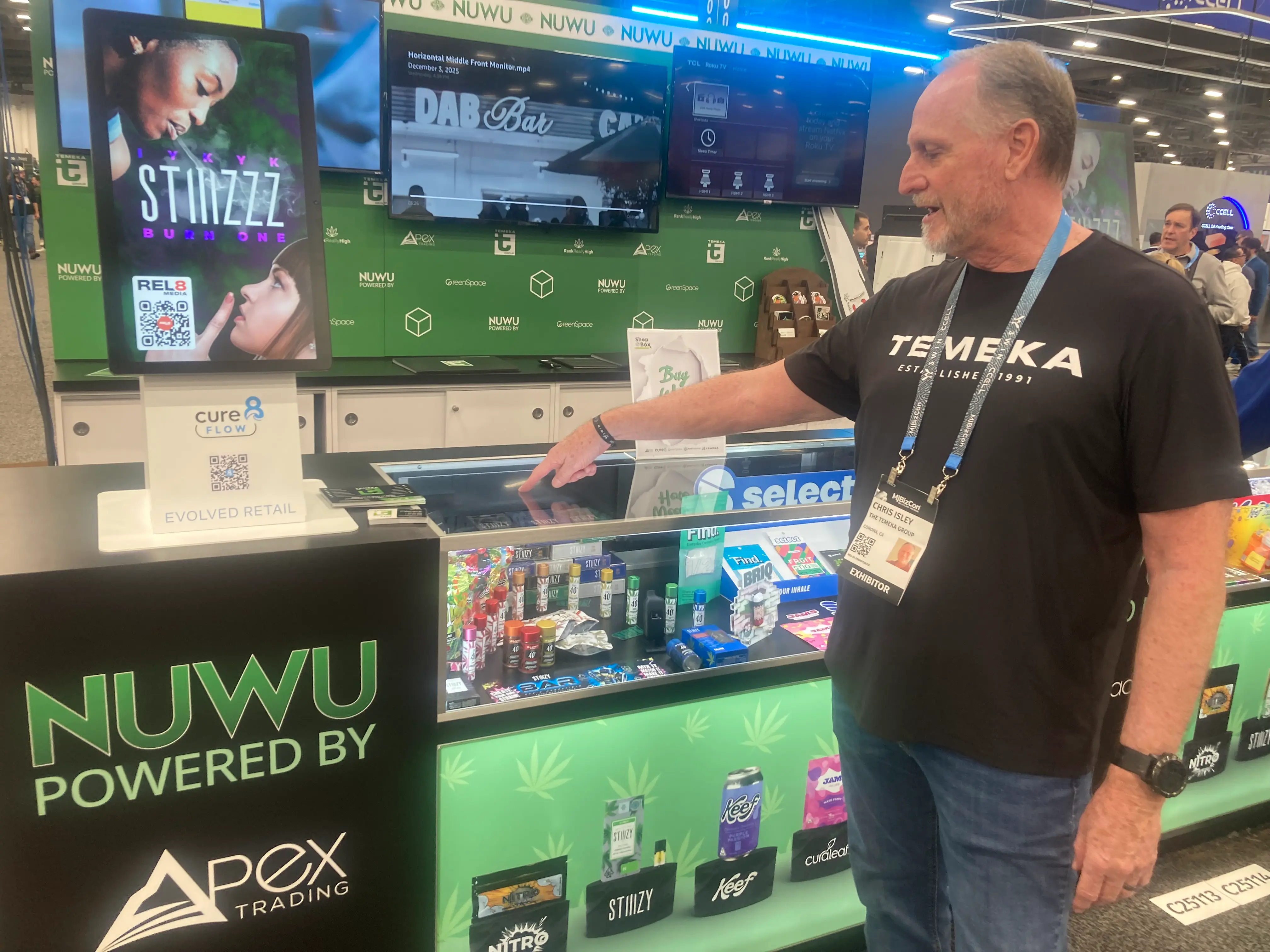 Chris Isley pointing at different types of cannabis