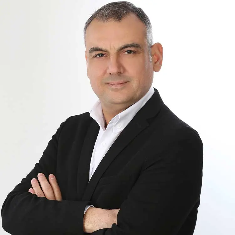 A headshot of Ozan Hunler