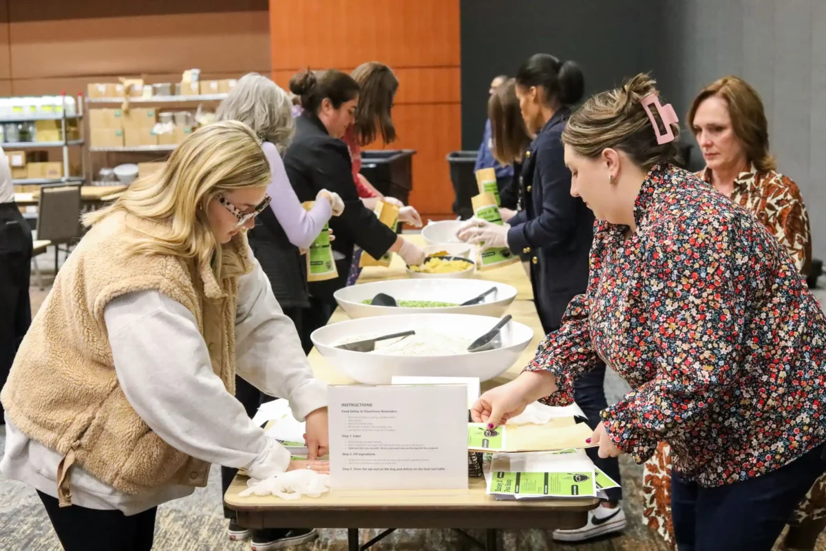 Volunteers at the Raleigh Convention Center packing soup meals during the November 2025 food drive to support the Food Bank of Central & Eastern North Carolina.