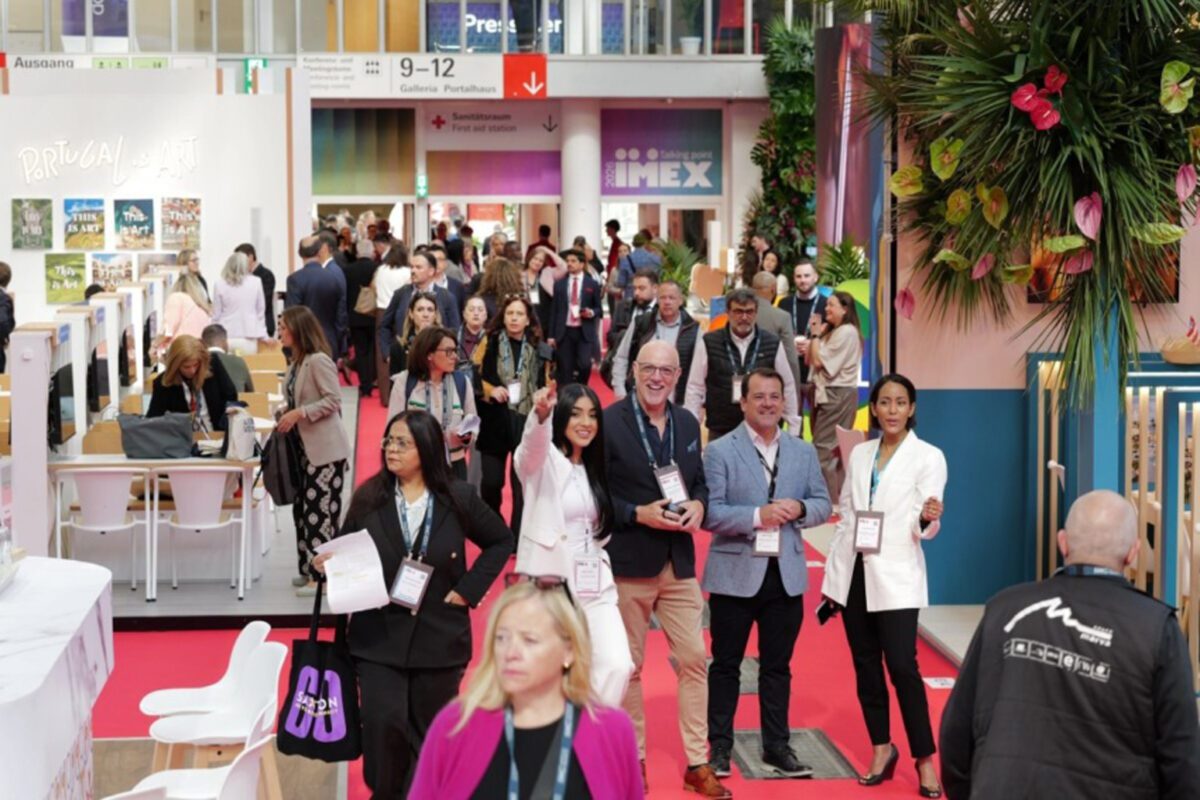 Attendees walk through the IMEX Frankfurt showfloor at Messe Frankfurt.