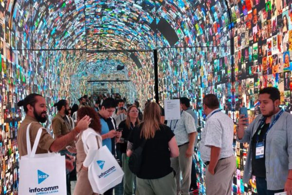 Attendees walk through an immersive audiovisual display at InfoComm América Latina.