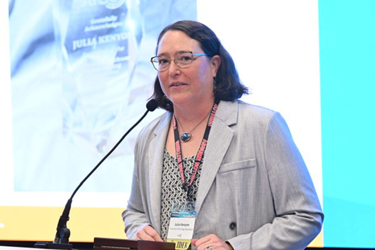 Julia Kenyon speaks at a podium during an ATSC event.