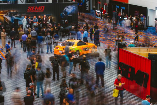 Attendees walk through the SEMA Show floor at the Las Vegas Convention Center.