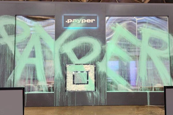 Custom ARCHEX tradeshow exhibit for Payper with large green graphics and illuminated signage.