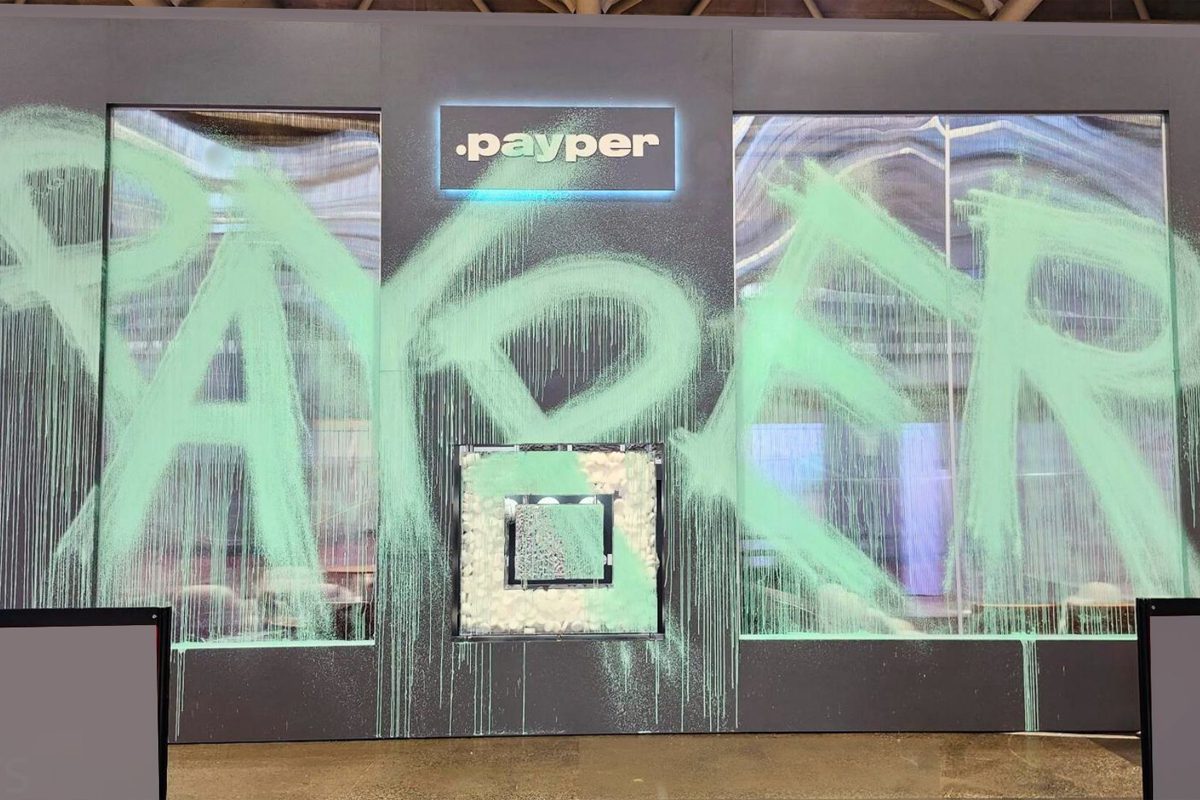 Custom ARCHEX tradeshow exhibit for Payper with large green graphics and illuminated signage.