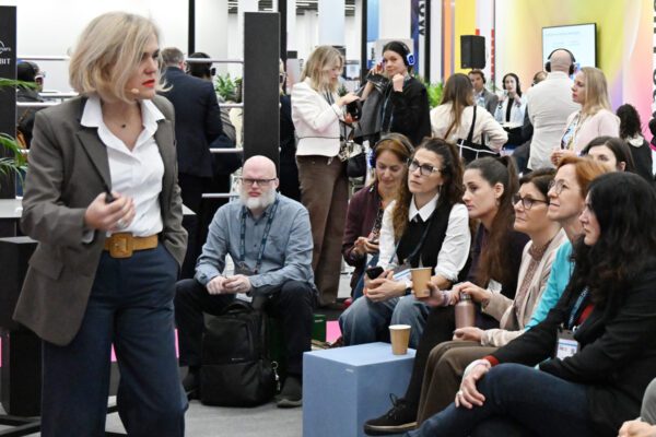 Attendees listen to a speaker during an education session at IMEX Frankfurt.