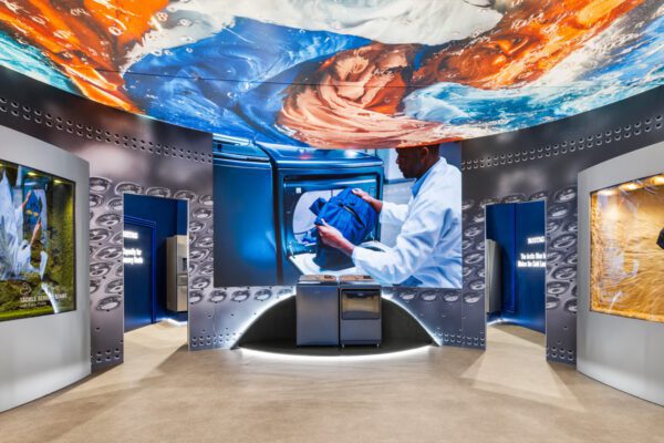 Whirlpool KBIS 2026 exhibit with immersive graphics, LED lighting, and appliance displays.