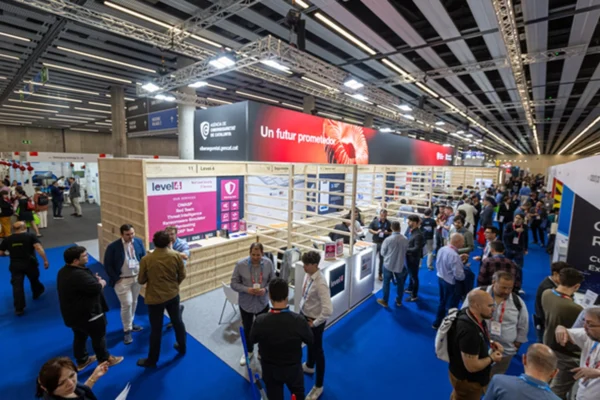 Attendees visit exhibitor booths at Barcelona Cybersecurity Congress.