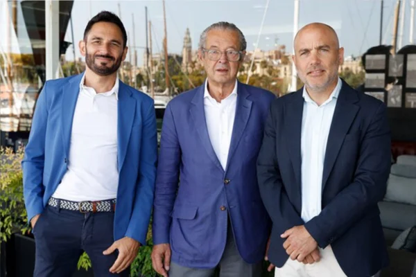 Josep Antoni Llopar, Luis Conde, and Jordi Carrasco stand together at the Barcelona International Boat Show.