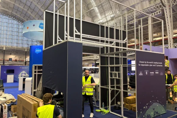 T3 Systems crew building a modular exhibition stand at a European tradeshow