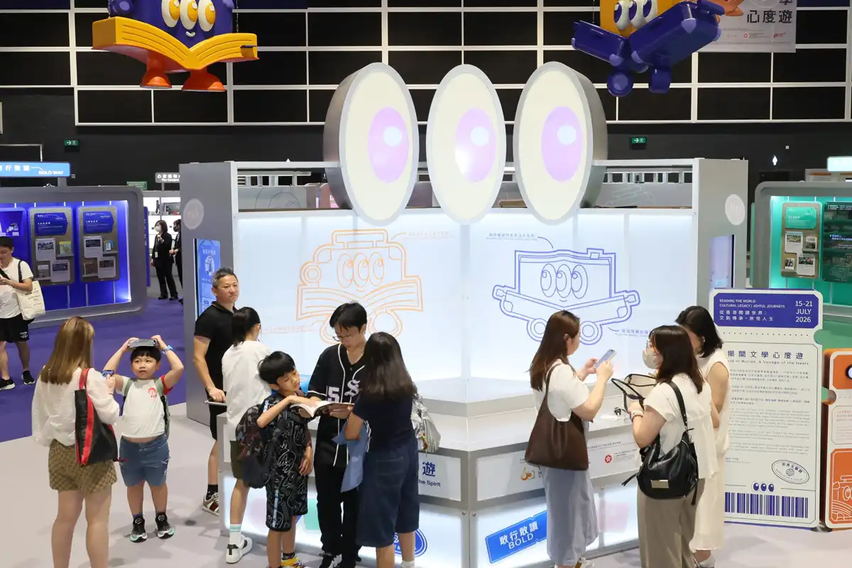 Visitors explore a cultural exhibition display at the Hong Kong Book Fair
