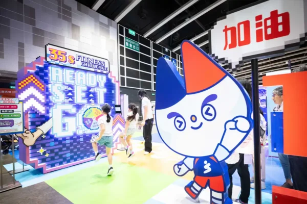 Children participate in an interactive fitness challenge at the Hong Kong Sports and Leisure Expo