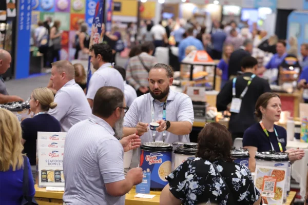 IDDBA attendees sample products on the show floor at Orange County Convention Center