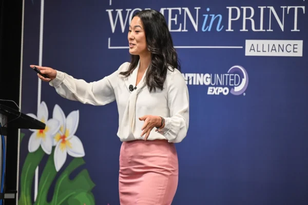 Joan Moon delivers the keynote during the 2025 Women in Print Alliance Luncheon